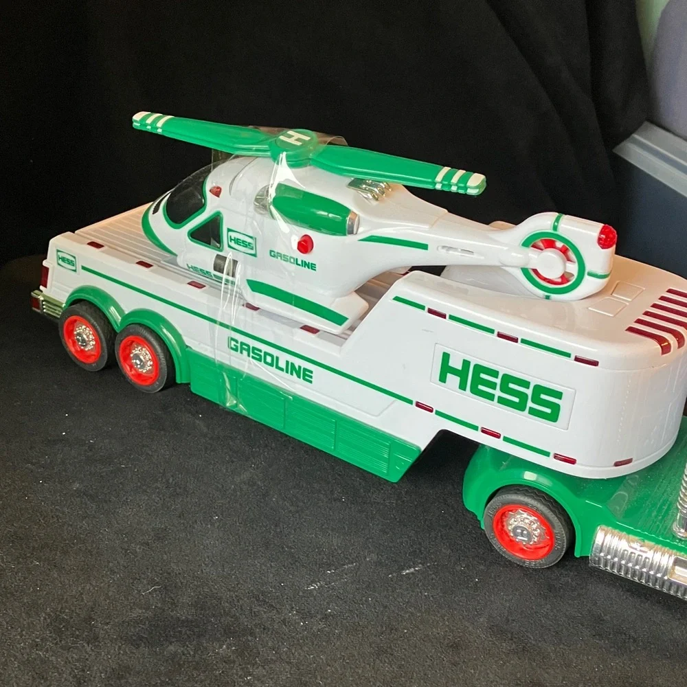 HESS Gasoline Semi Truck carrying helicopter Toy 2010 Toy plays sounds
